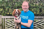 Blake Stephenson in a keech hospice care t-shirt with his dog Millie