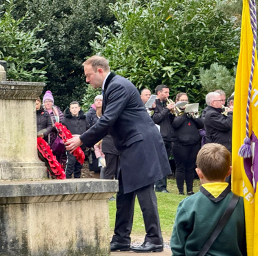 Blake Stephenson MP laying a wreath